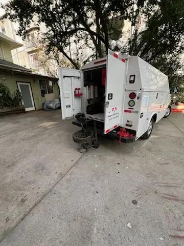 Magnet Plumbing service vehicle on-site for Grease Trap Cleaning in Jupiter Farms